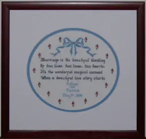 example of needlework framing with oval mat
